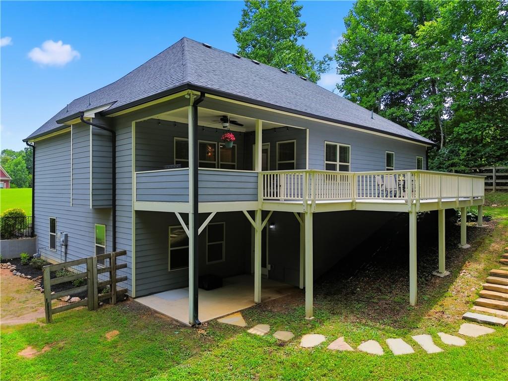 302 Spence Circle Ball Ground, GA 30107 - Photo 42 of 55 a view of a house with a yard and sitting area