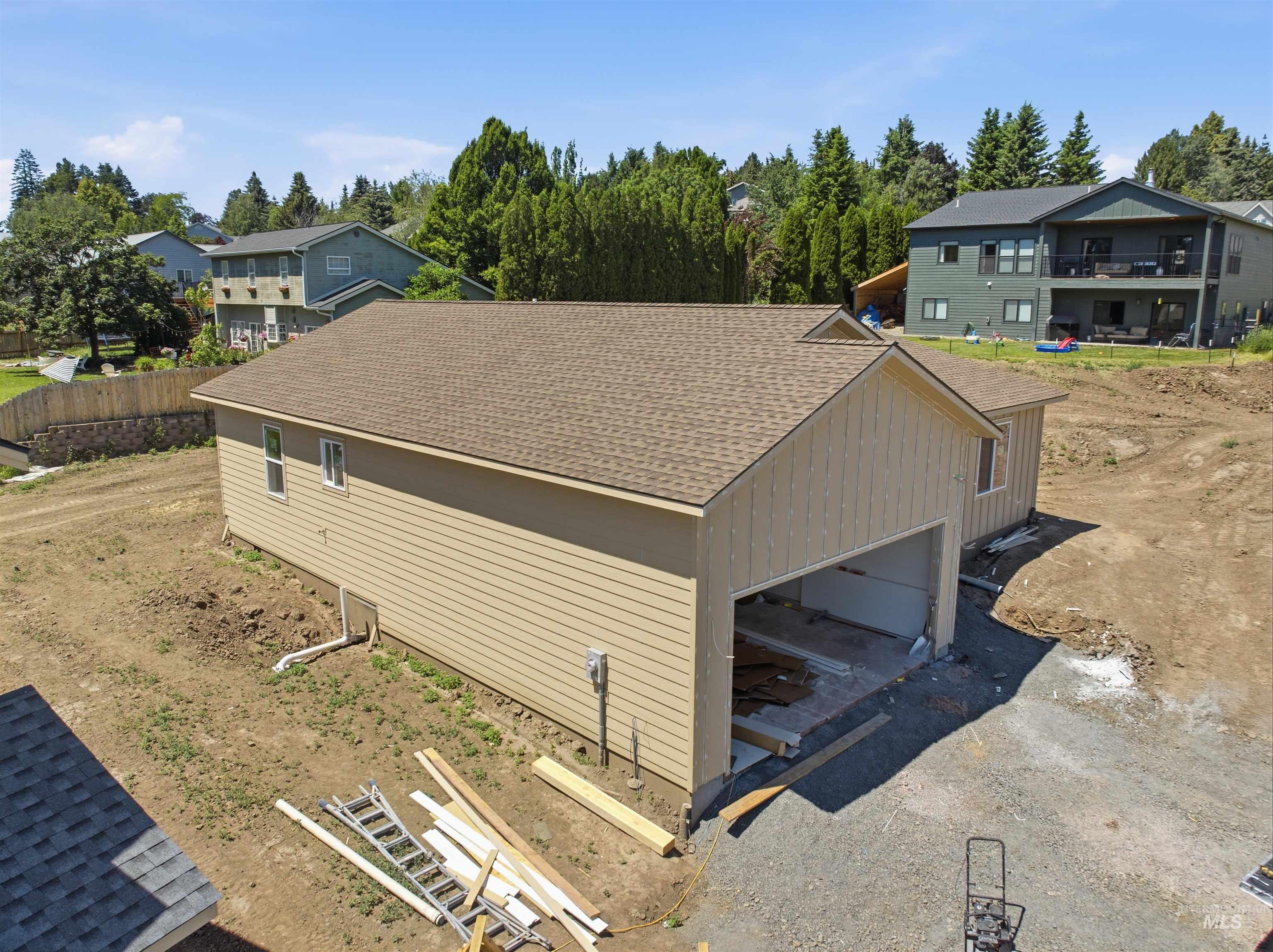 2812 Cyprus Court Moscow, ID 83843 - Photo 2 of 22 Contemporary single-story residence with white board-and-batten siding