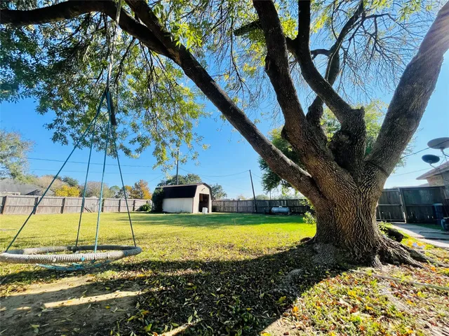 a view of a swimming pool with a garden