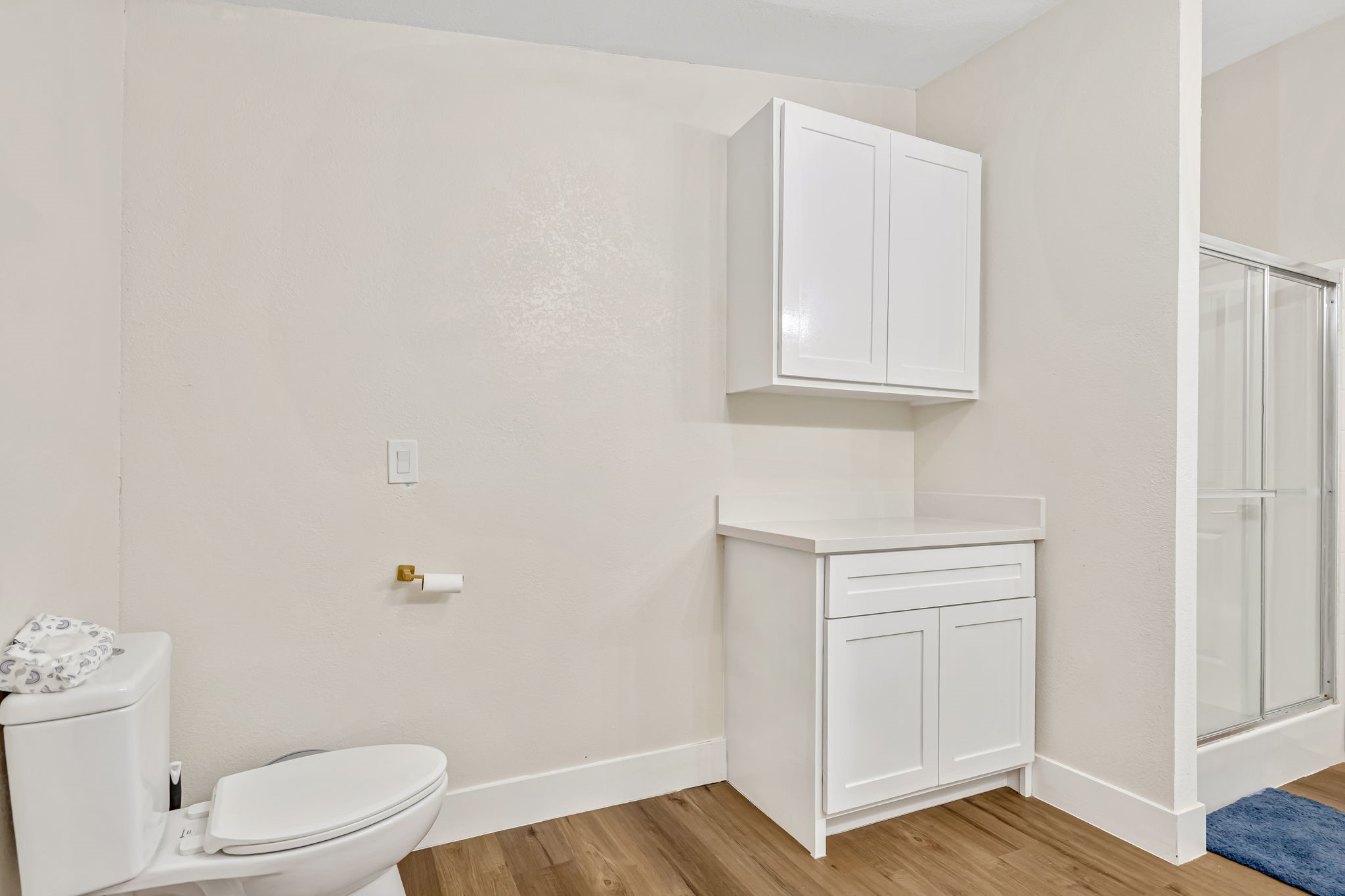 1491 Pecan Valley Road Wharton, TX 77488 - Photo 17 of 38 a bathroom with a toilet a sink a vanity and mirror
