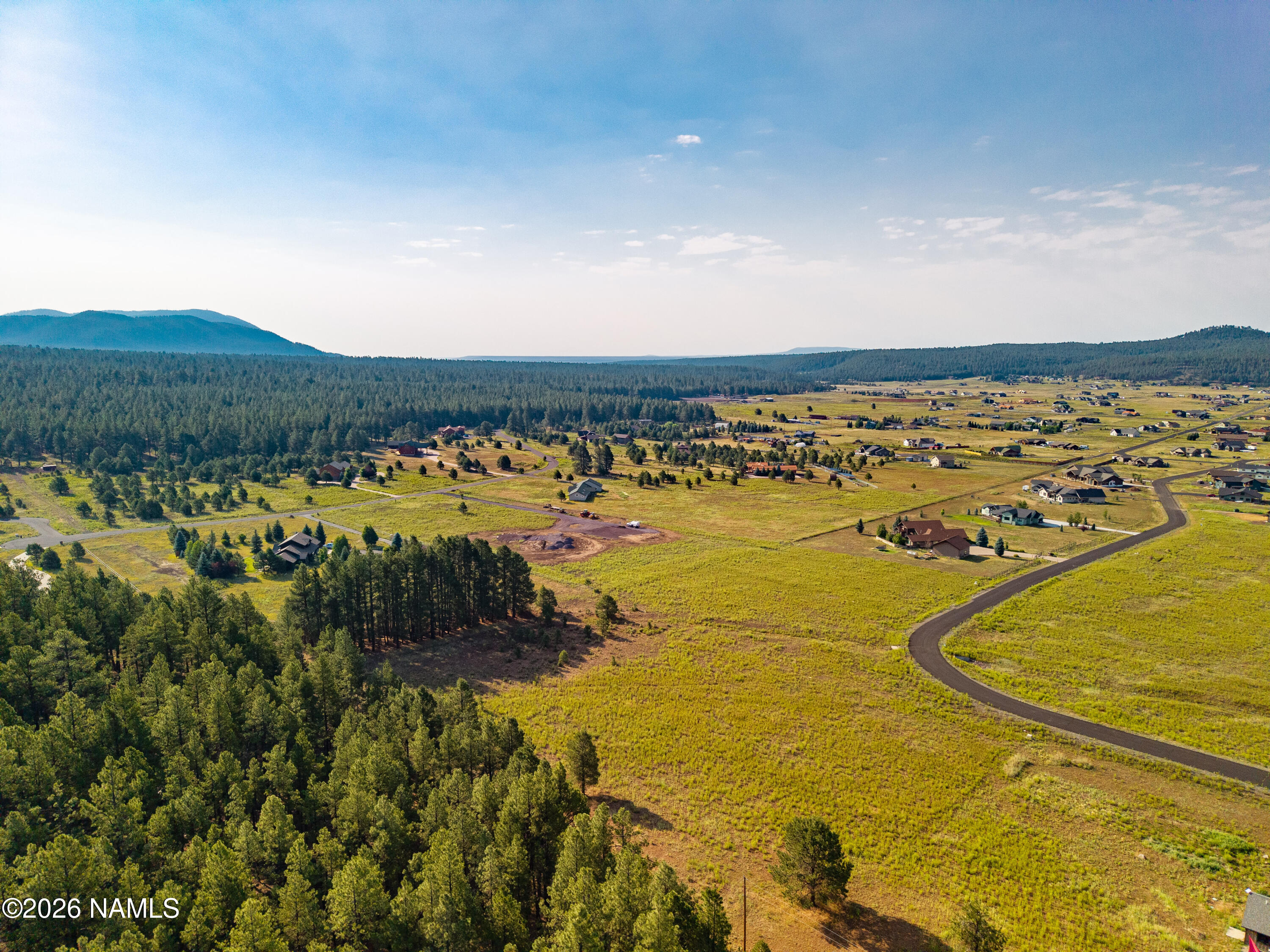 9199 Ranch At The Peaks Way Flagstaff, AZ 86001 - Photo 4 of 11 a view of a ocean with city