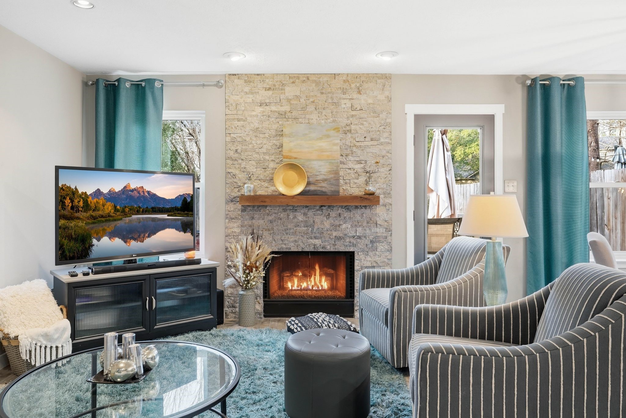 51 Wineberry Place Spring, TX 77382 - Photo 17 of 45 a living room with furniture and a fireplace