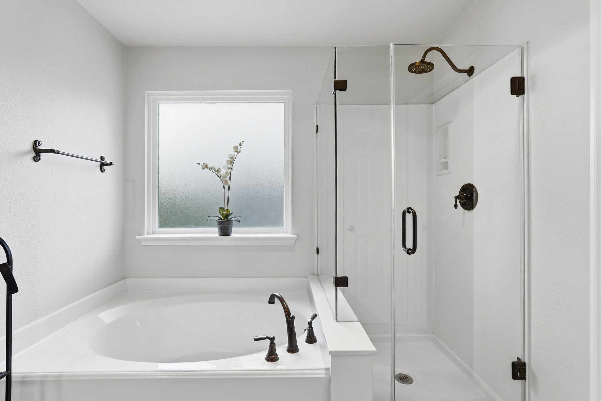 51 Wineberry Place Spring, TX 77382 - Photo 26 of 45 a white bath tub sitting next to a shower