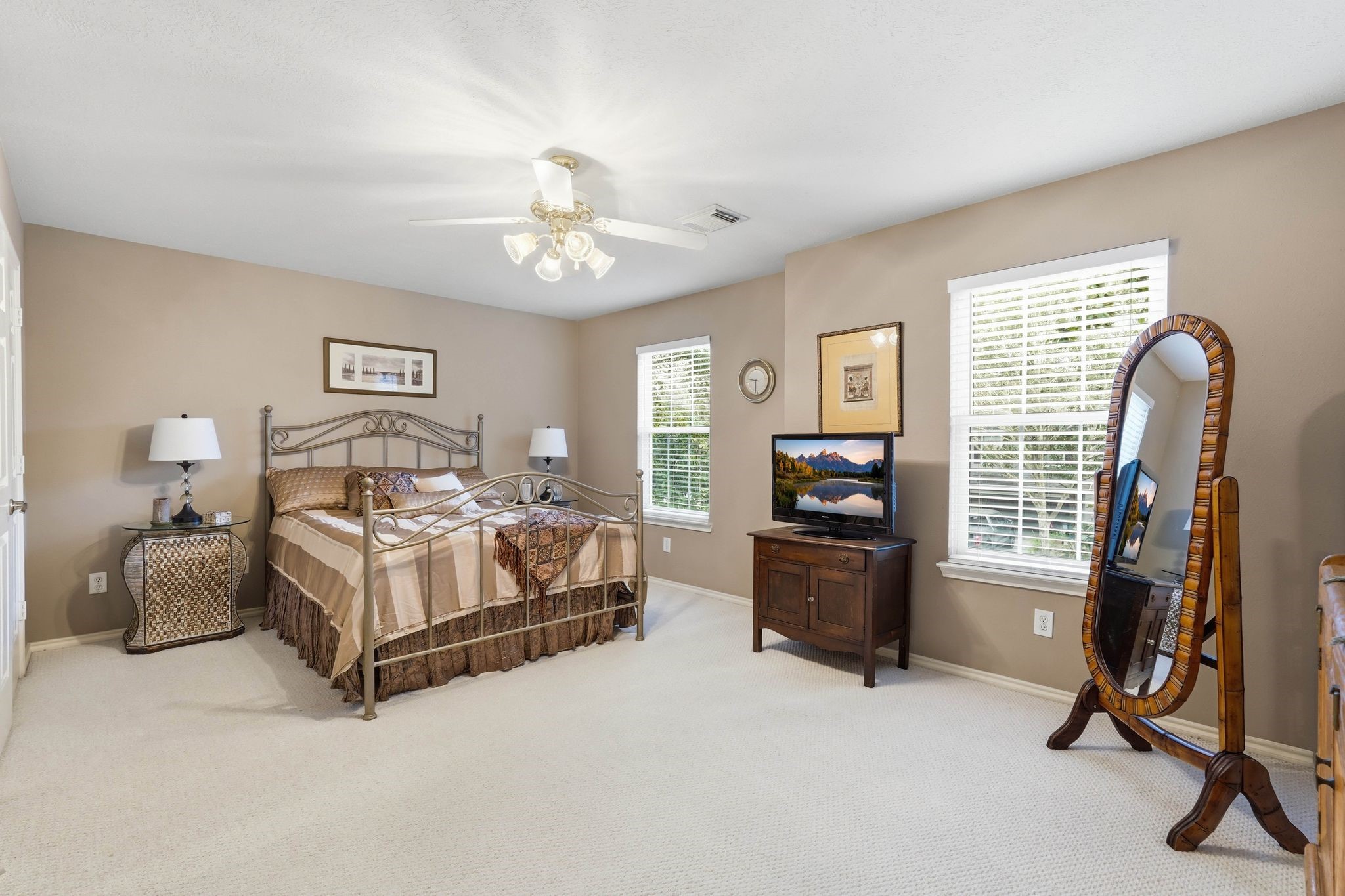 51 Wineberry Place Spring, TX 77382 - Photo 29 of 45 a bedroom with bed tv and furniture