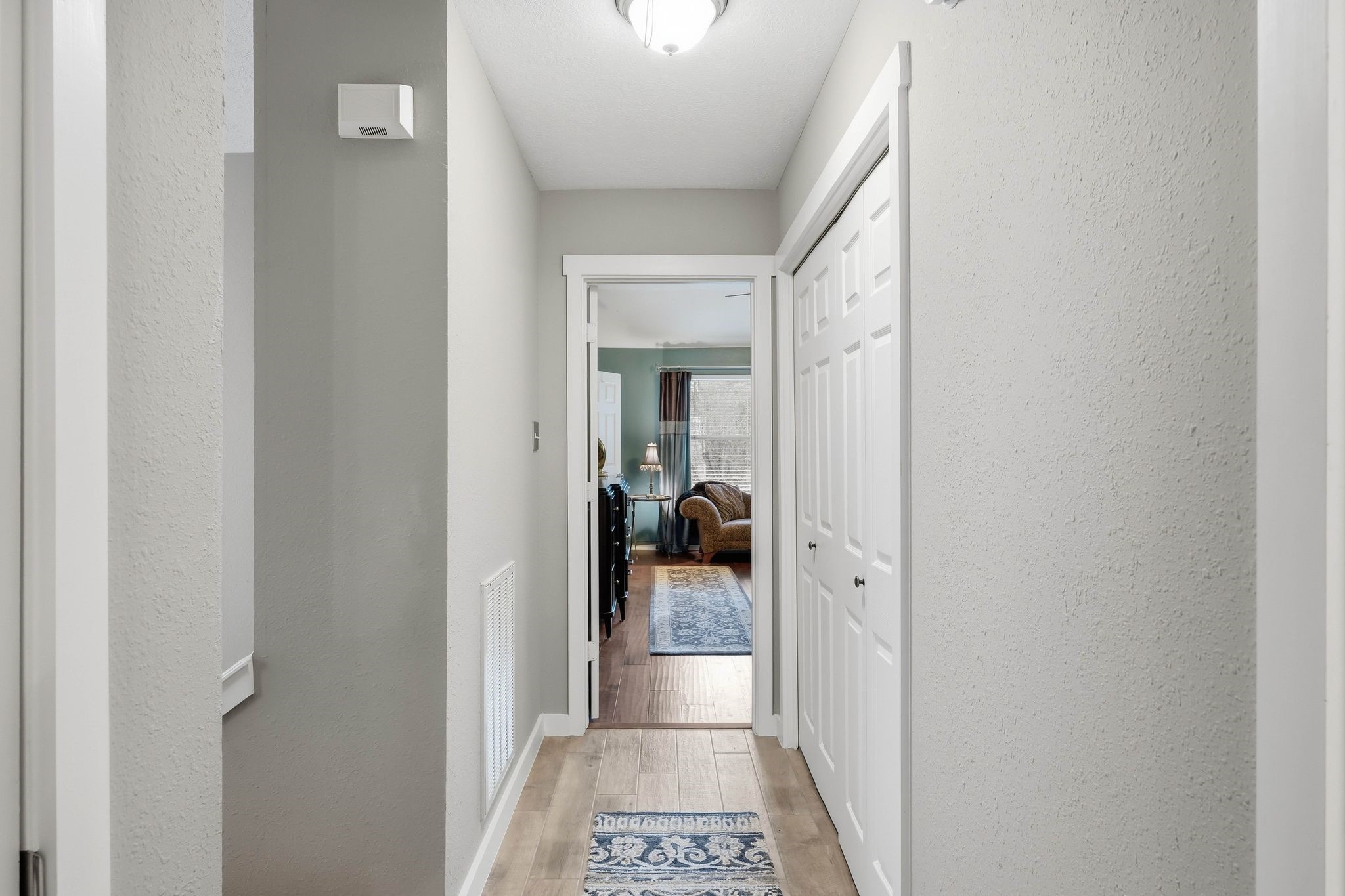 51 Wineberry Place Spring, TX 77382 - Photo 32 of 45 a view of a hallway with white walls
