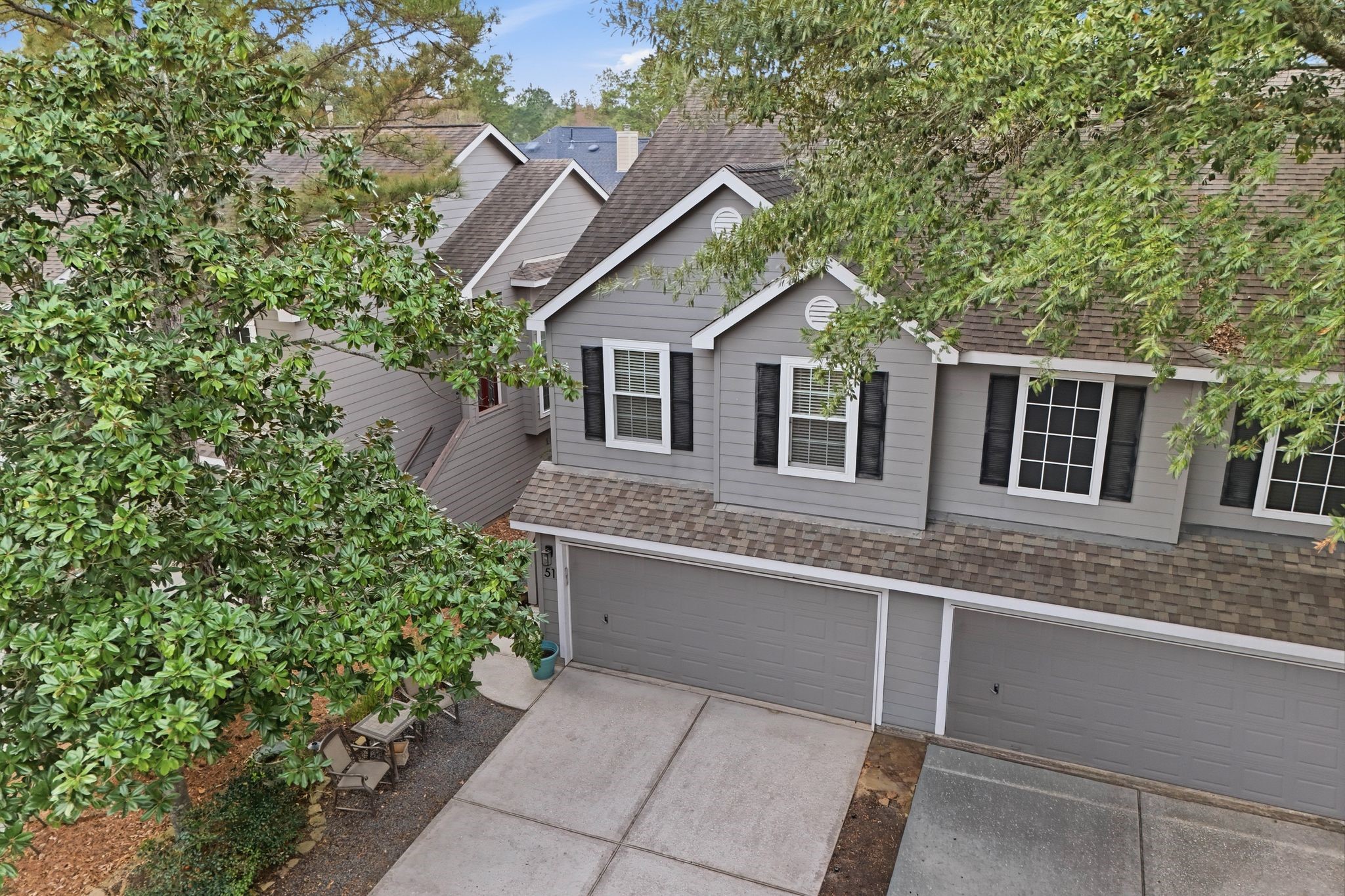 51 Wineberry Place Spring, TX 77382 - Photo 40 of 45 a house view with a outdoor space