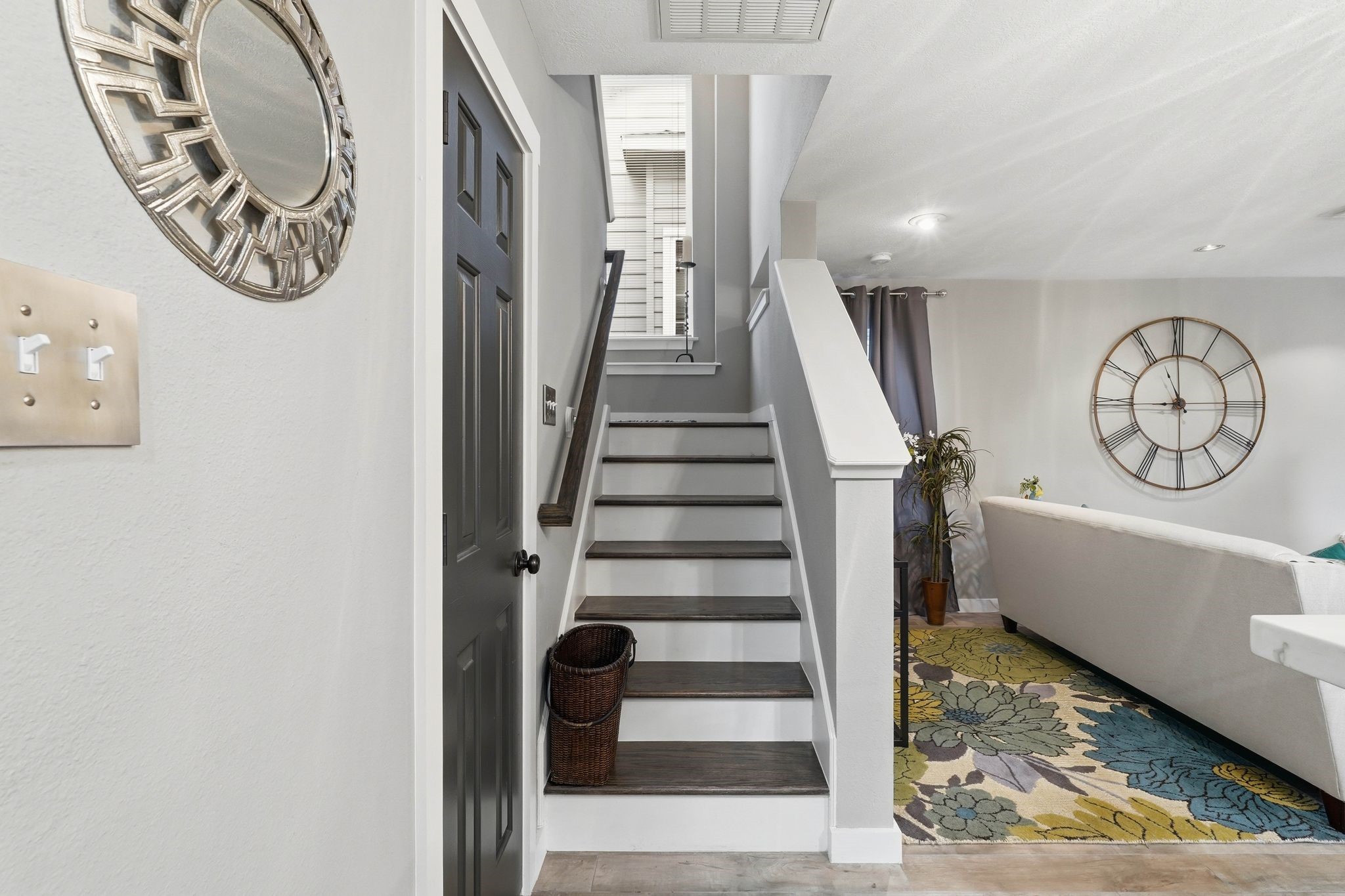 51 Wineberry Place Spring, TX 77382 - Photo 6 of 45 a view of a hallway with entryway wooden floor and front door