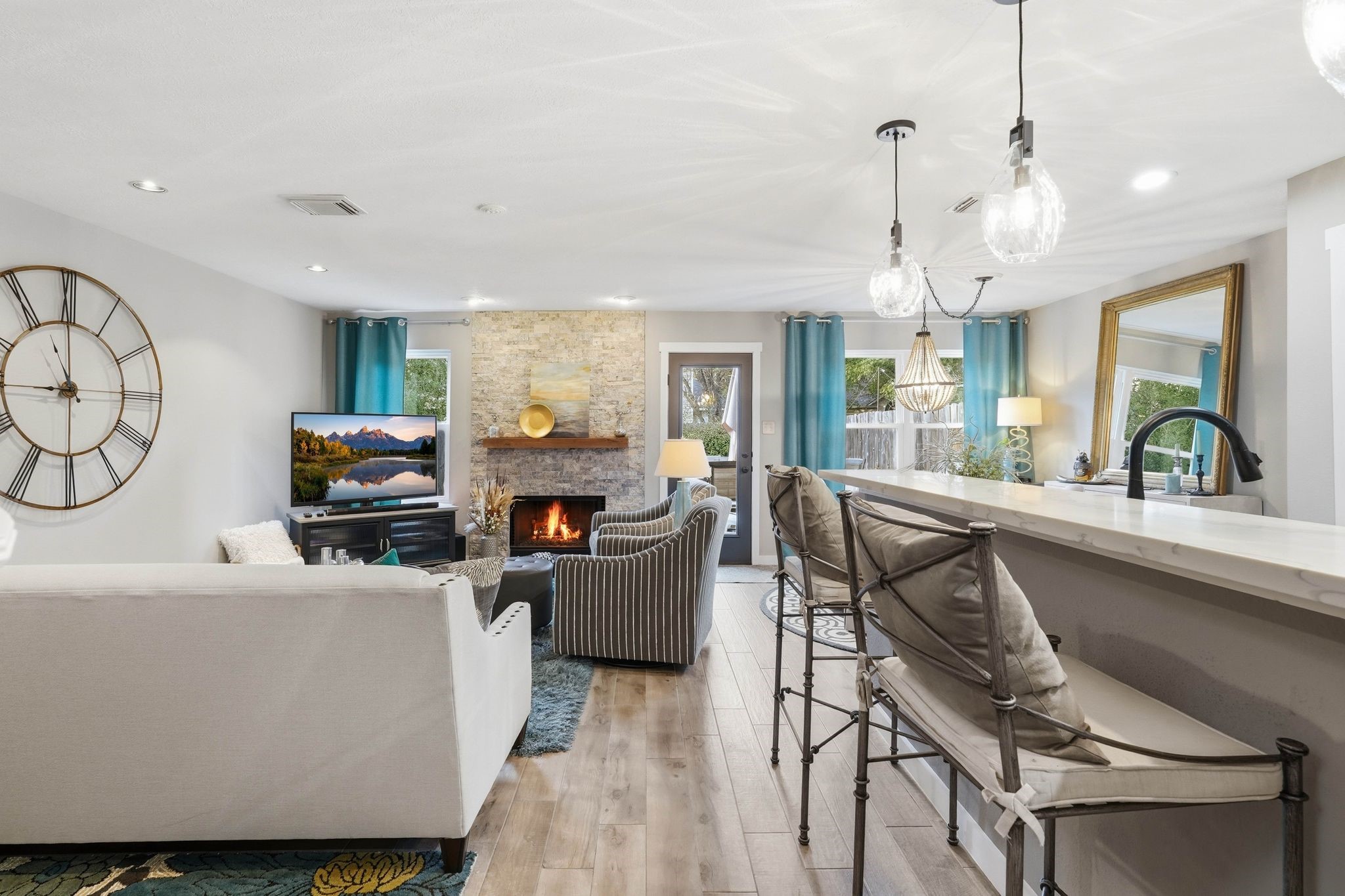 51 Wineberry Place Spring, TX 77382 - Photo 7 of 45 a living room with furniture and a chandelier