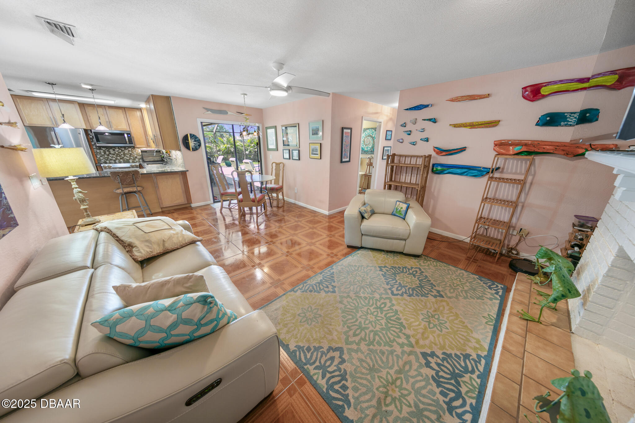 4350 Candlewood Lane Ponce Inlet, FL 32127 - Photo 11 of 60 a living room with furniture and a table