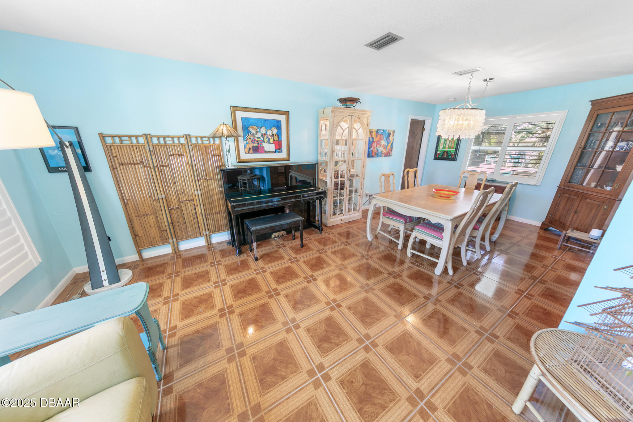 4350 Candlewood Lane Ponce Inlet, FL 32127 - Photo 14 of 60 a living room with furniture a piano and a rug
