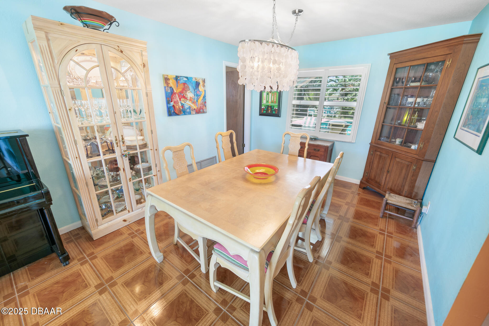 4350 Candlewood Lane Ponce Inlet, FL 32127 - Photo 15 of 60 a view of a dining room with furniture window and outside view