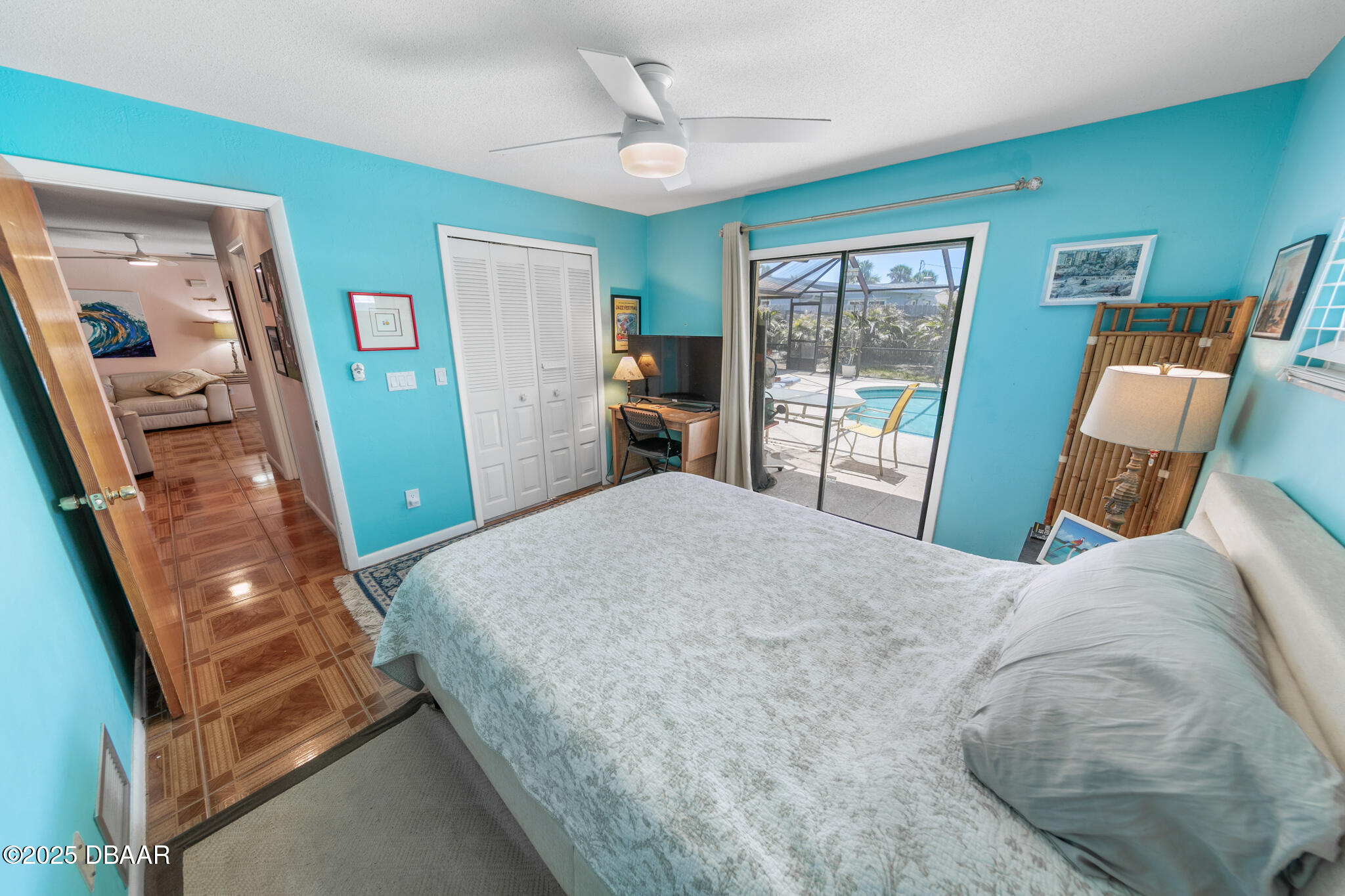 4350 Candlewood Lane Ponce Inlet, FL 32127 - Photo 31 of 60 a bedroom with a bed and a large window