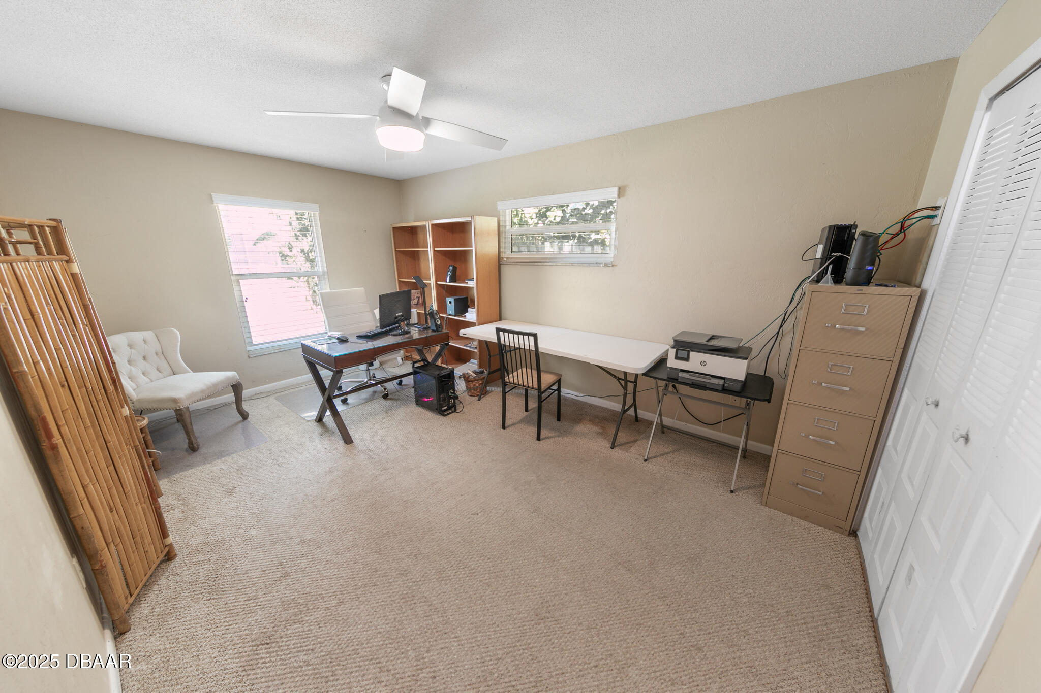 4350 Candlewood Lane Ponce Inlet, FL 32127 - Photo 33 of 60 a living room with furniture and a window