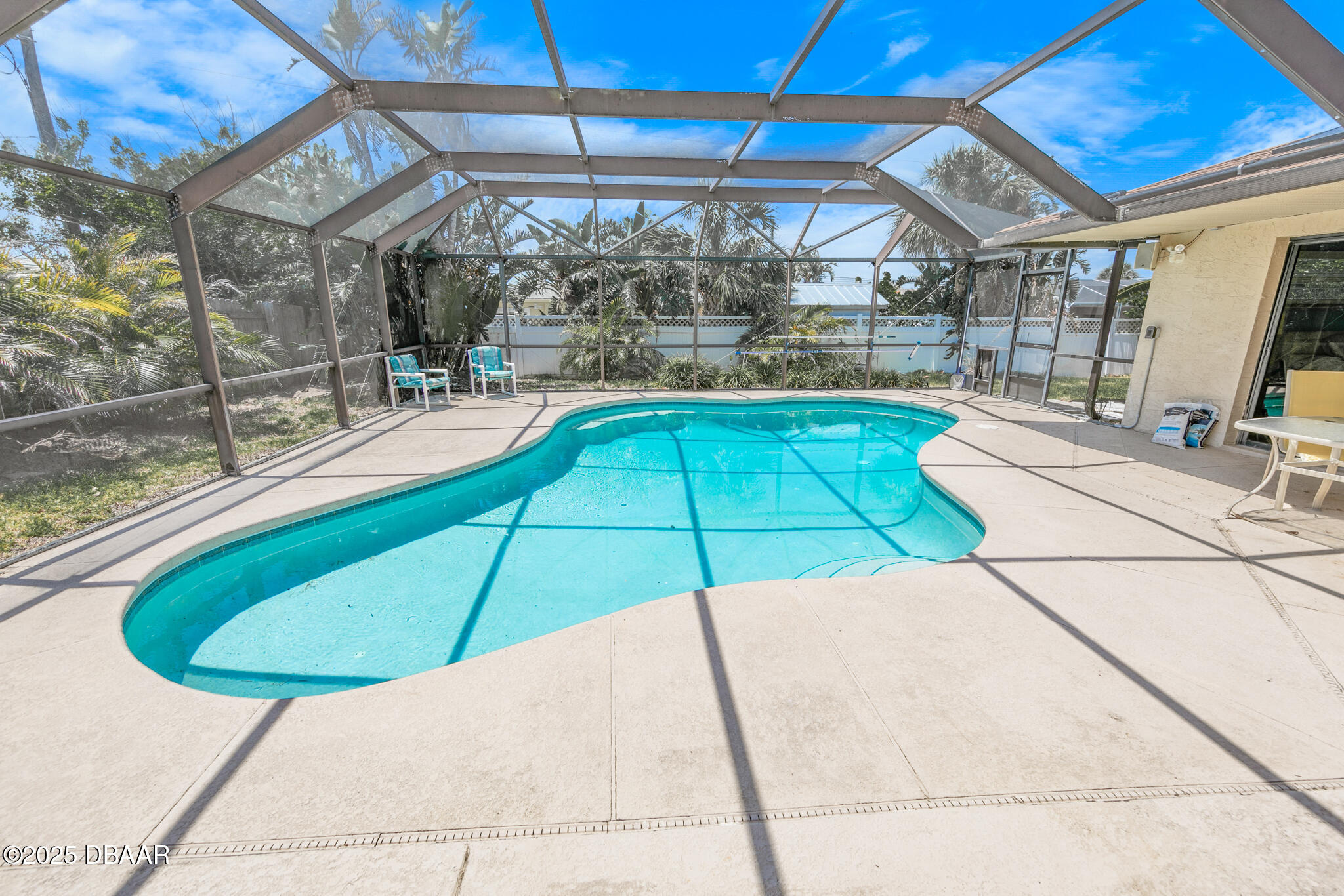 4350 Candlewood Lane Ponce Inlet, FL 32127 - Photo 36 of 60 a swimming pool with outdoor seating and yard