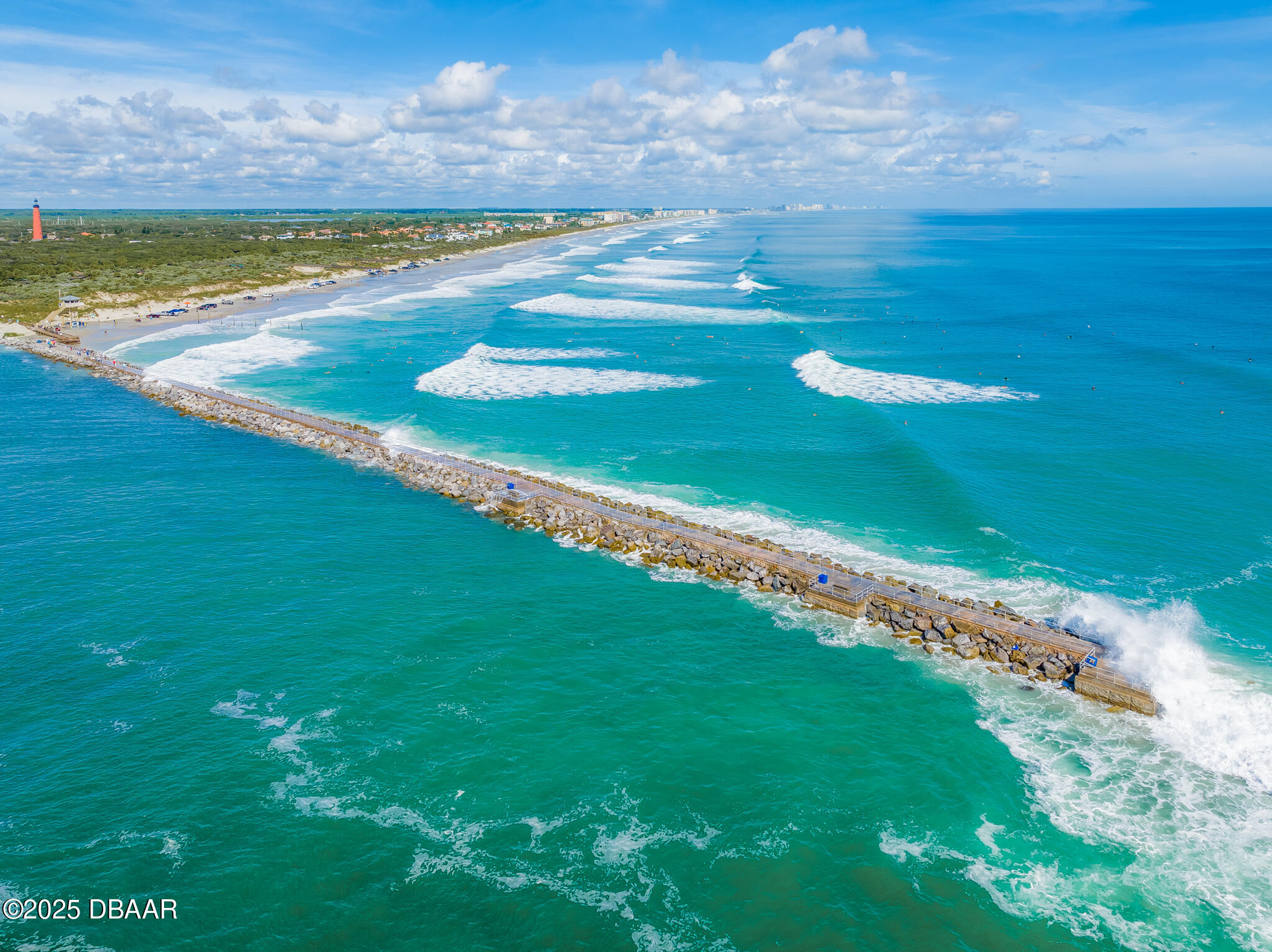 4350 Candlewood Lane Ponce Inlet, FL 32127 - Photo 45 of 60 a view of an ocean and beach