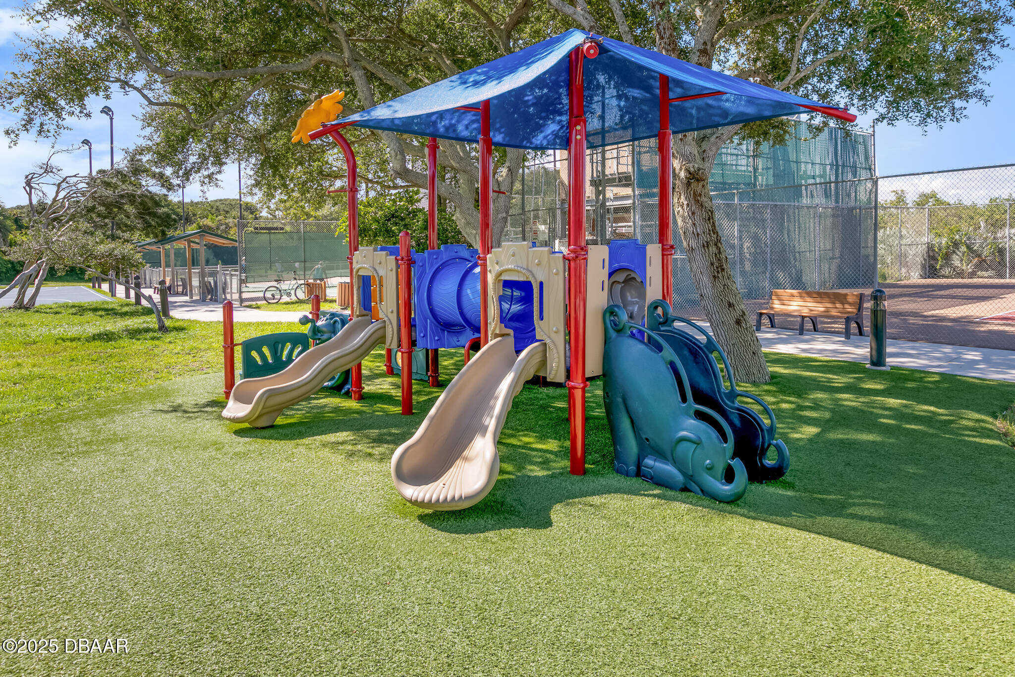 4350 Candlewood Lane Ponce Inlet, FL 32127 - Photo 58 of 60 a view of a park with a slide