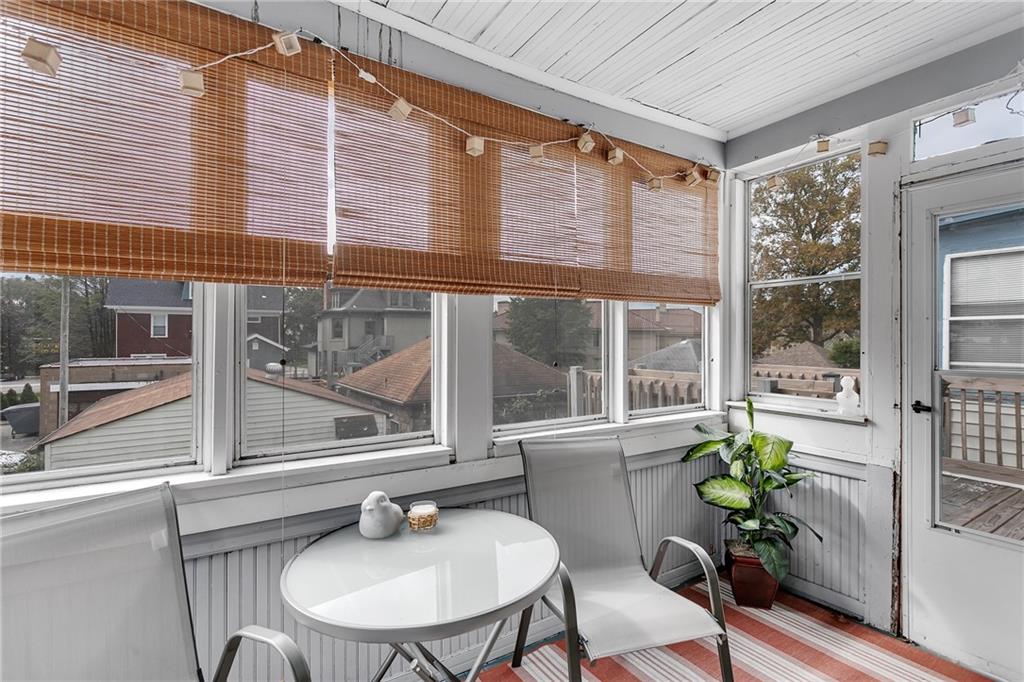 713 Clinton Place Pittsburgh, PA 15202 - Photo 19 of 31 a room with furniture and a potted plant