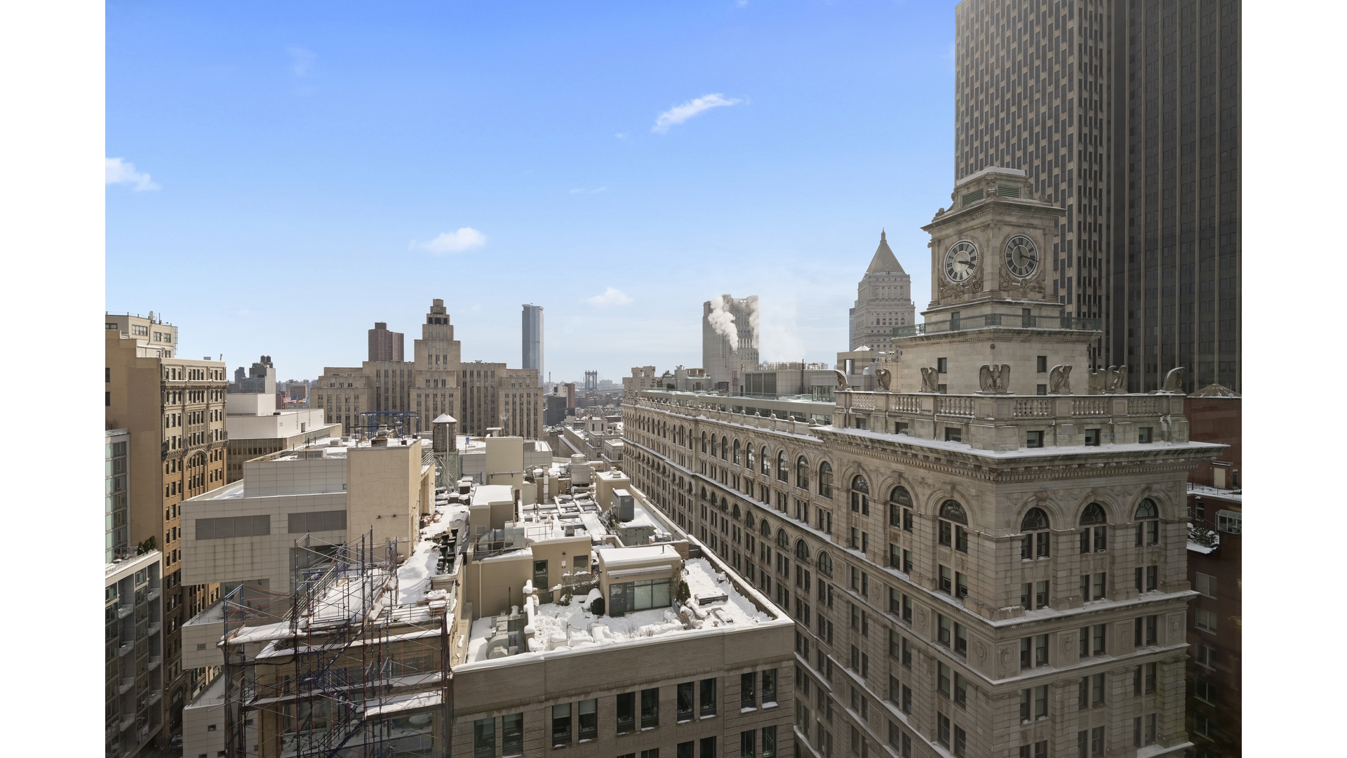 91 Leonard Street, Unit PH1 Manhattan, NY 10013 - Photo 14 of 25 a view of city with tall buildings