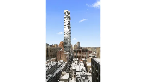 a view of city with tall buildings