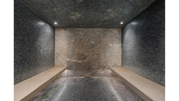 a bathroom with a bathtub and shower