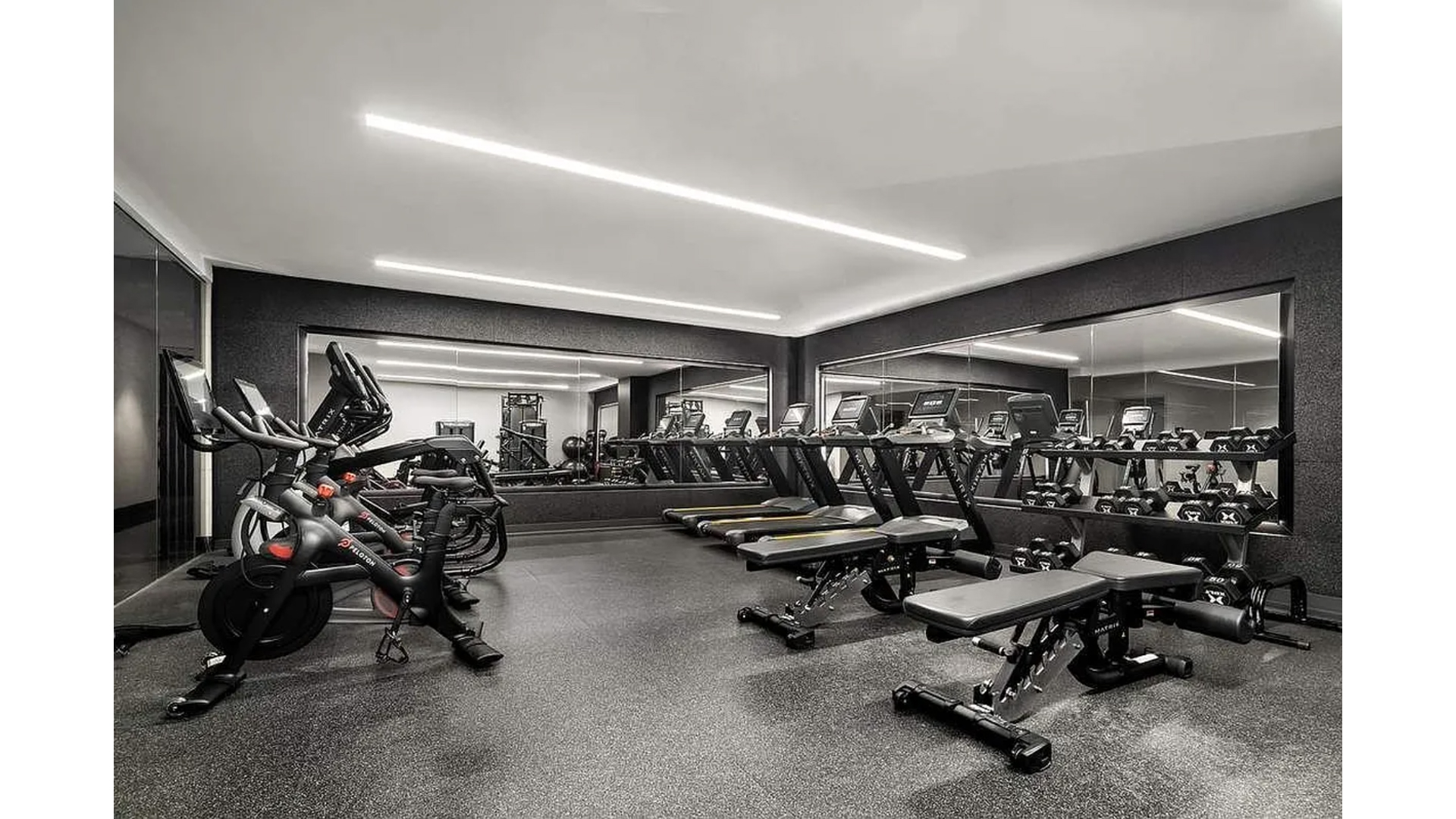 91 Leonard Street, Unit PH1 Manhattan, NY 10013 - Photo 19 of 25 a view of a room with gym equipment