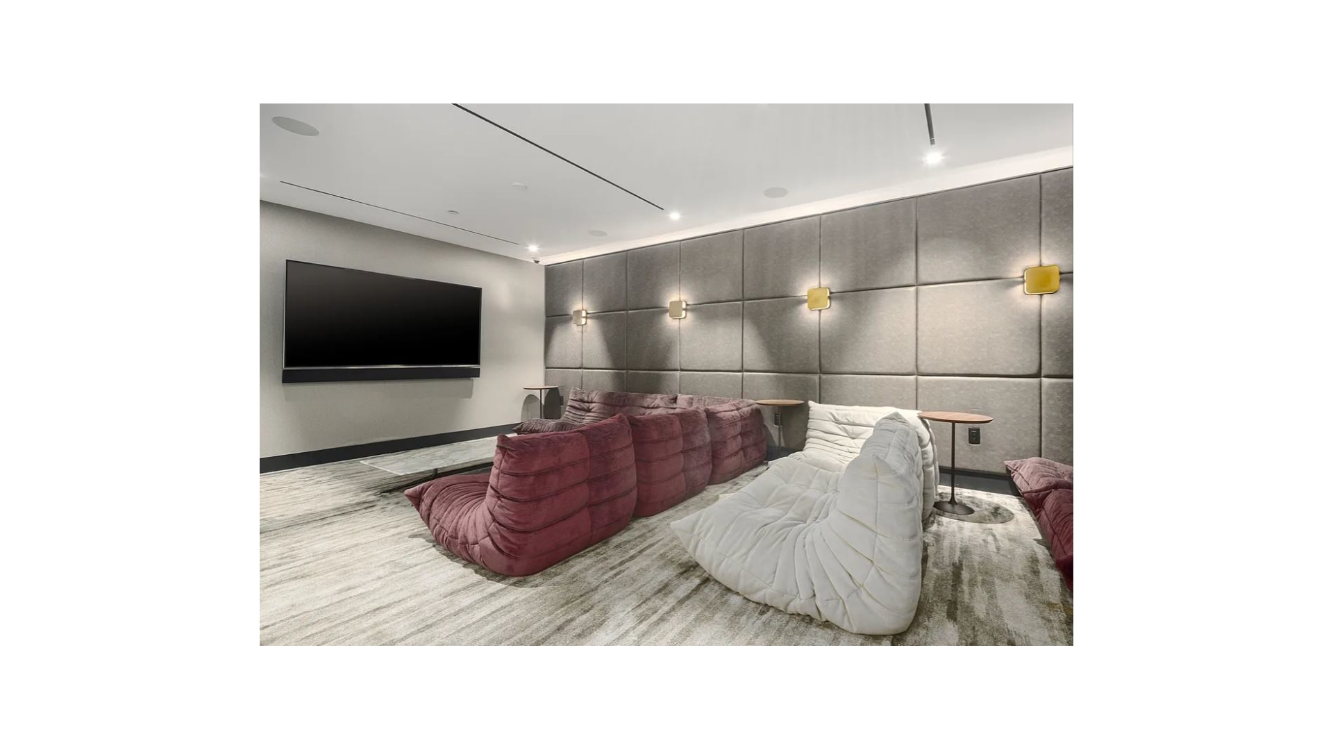 91 Leonard Street, Unit PH1 Manhattan, NY 10013 - Photo 20 of 25 a living room with a couch and a flat screen tv