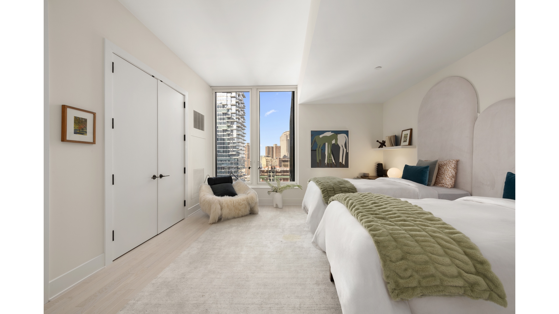 91 Leonard Street, Unit PH1 Manhattan, NY 10013 - Photo 8 of 25 a bedroom with a bed and a large mirror