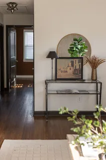 a kitchen with stainless steel appliances a stove sink microwave and cabinets