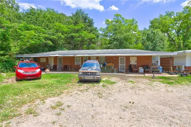 a house view with a garden space