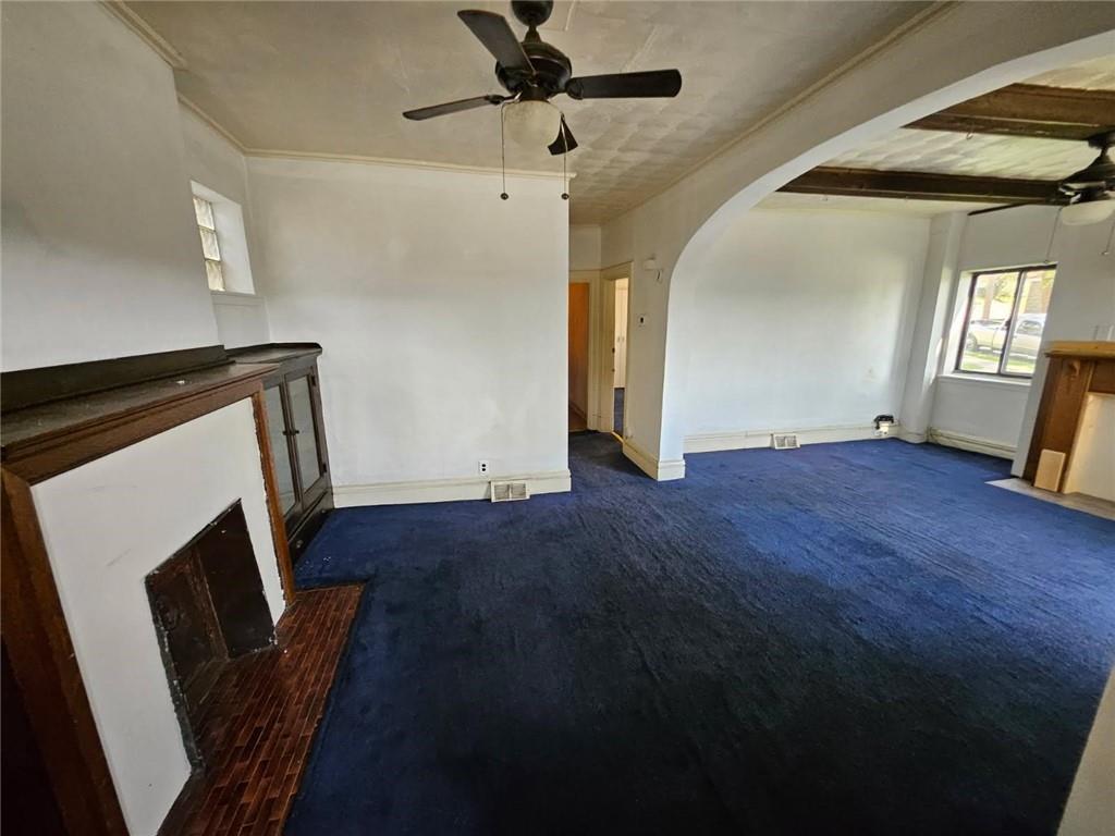 1907 Delaware Avenue, Unit 1 Pittsburgh, PA 15218 - Photo 3 of 12 a view of empty room with wooden floor and fan