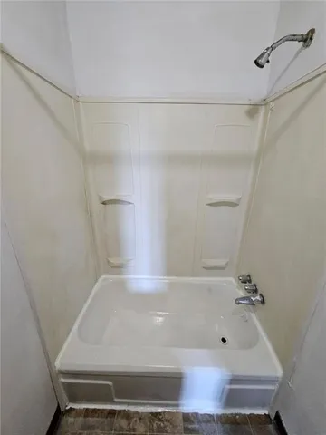 a bathroom with a bathtub