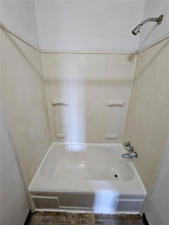 1907 Delaware Avenue, Unit 1 Pittsburgh, PA 15218 - Photo 10 of 12 a bathroom with a bathtub