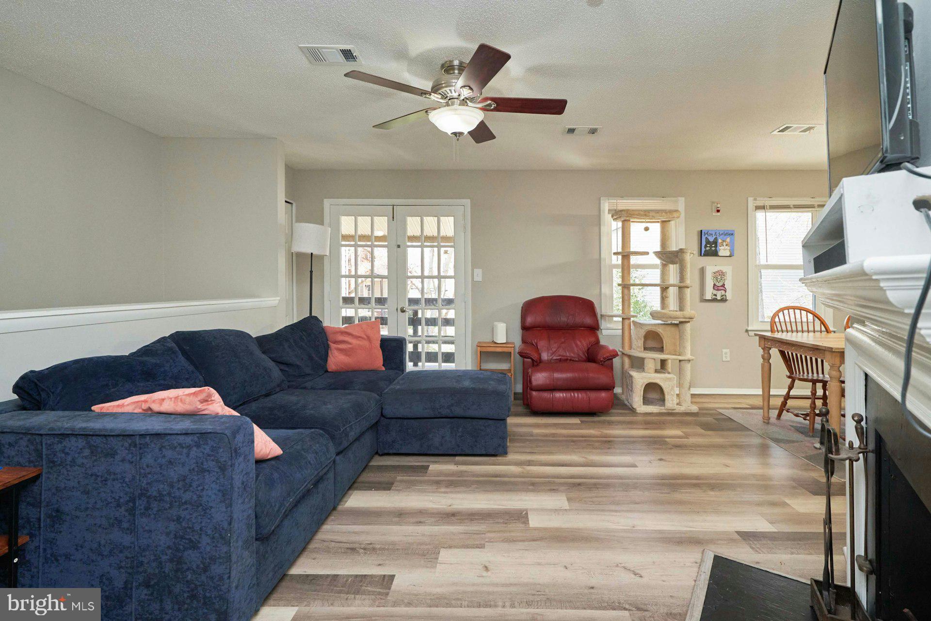 2841 Chablis Circle Woodbridge, VA 22192 - Photo 6 of 29 Luxury vinyl plank and a ceiling fan