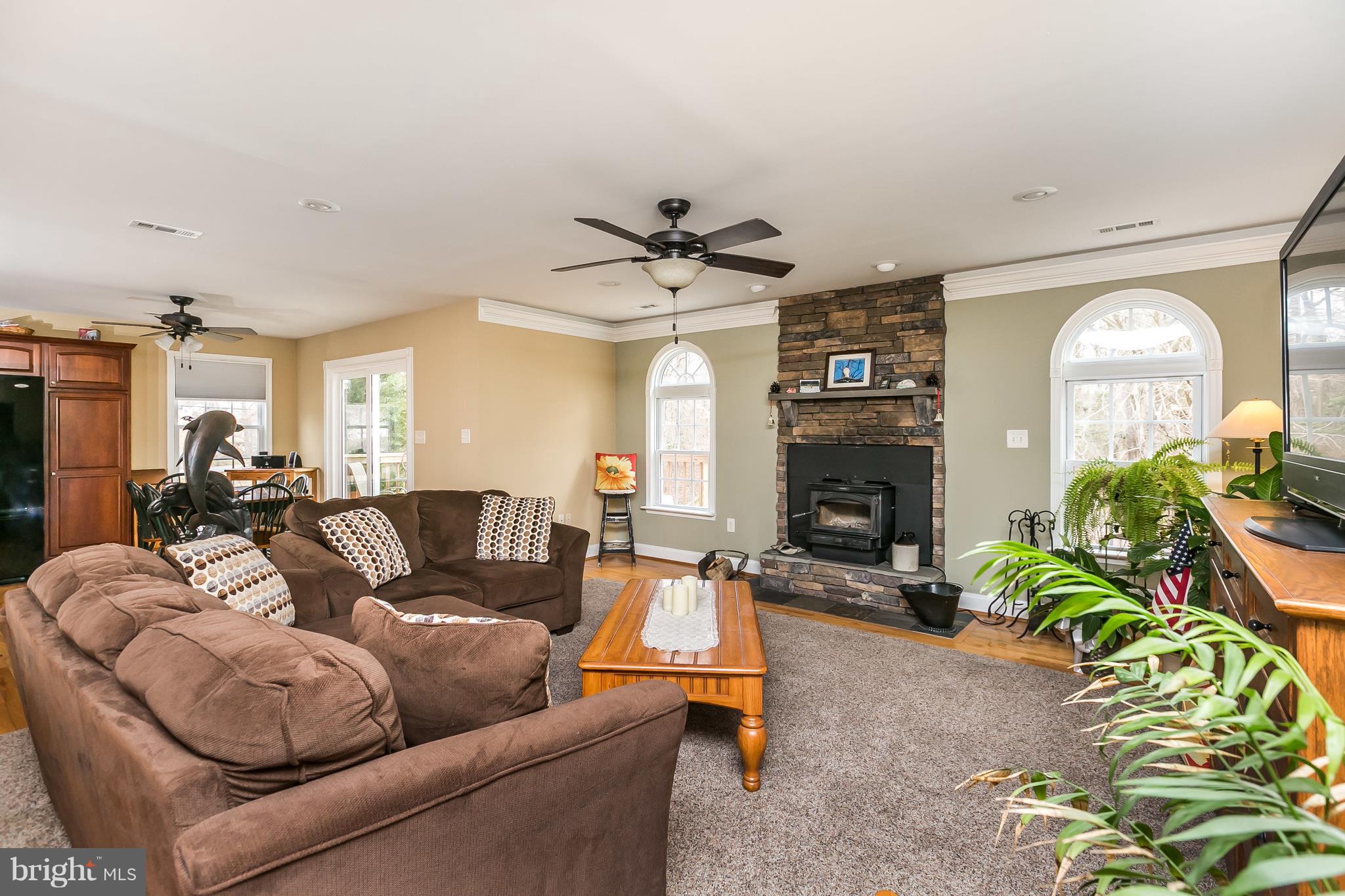 1013 Beach Road Baltimore, MD 21221 - Photo 10 of 30 Stone wood burning fireplace with insert