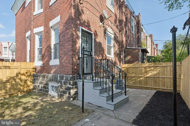 a view of a building with a street