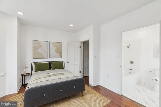 a bathroom with a sink toilet and bathtub