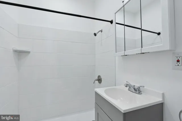 a view of an empty room with stairs