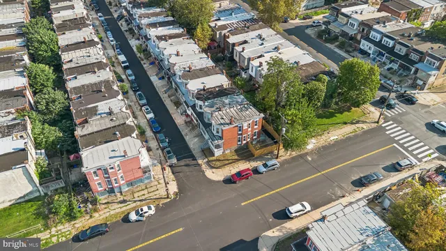 a front view of a building with street view