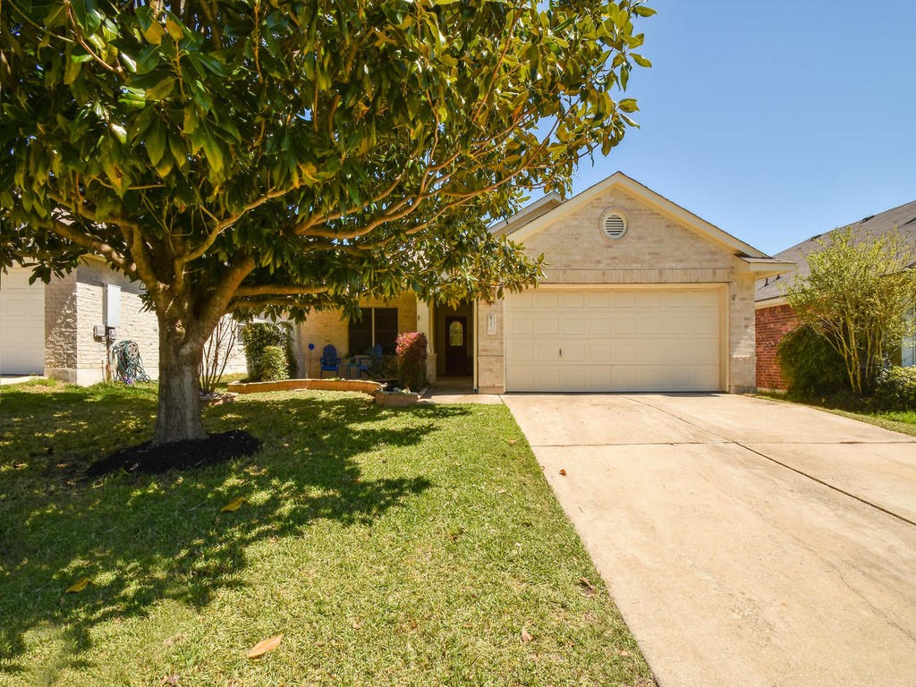 2632 Gate Ridge Drive Austin, TX 78748 - Photo 1 of 1 a front view of a house with garden