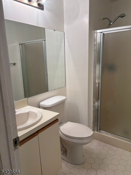28 Rutgers Drive Newark, NJ 07103 - Photo 13 of 22 a bathroom with a granite countertop sink toilet and shower