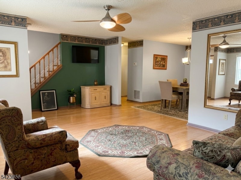 28 Rutgers Drive Newark, NJ 07103 - Photo 3 of 22 a living room with furniture and a flat screen tv