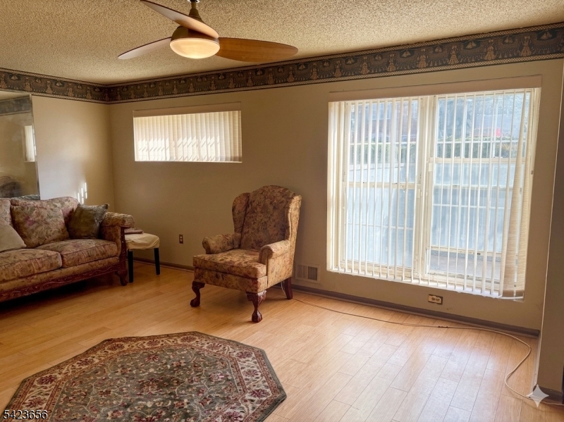28 Rutgers Drive Newark, NJ 07103 - Photo 4 of 22 a living room with furniture and a window