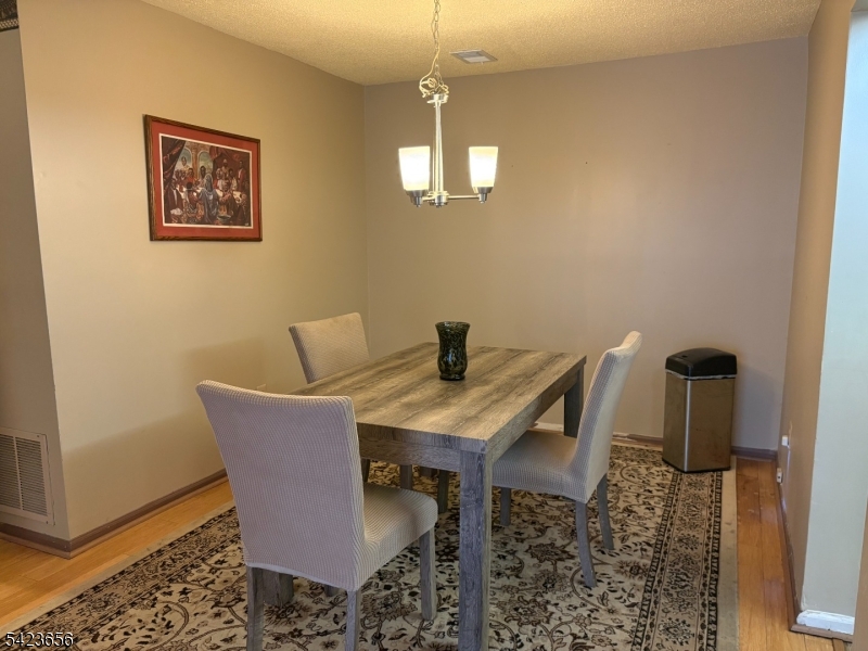 28 Rutgers Drive Newark, NJ 07103 - Photo 6 of 22 a view of a dining room with furniture and wooden floor