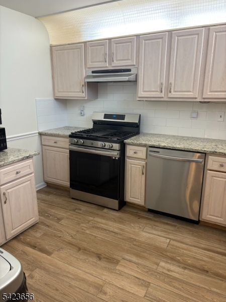 28 Rutgers Drive Newark, NJ 07103 - Photo 9 of 22 a kitchen with a stove and a sink