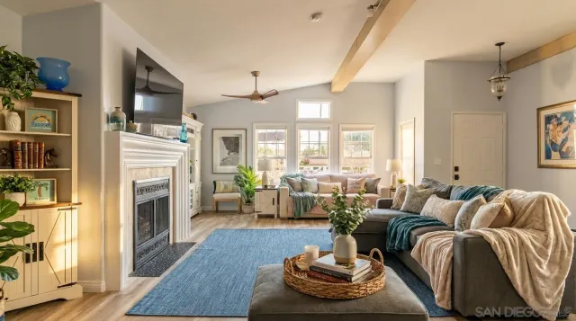 a living room with furniture fireplace and a flat screen tv