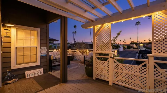 a view of living room with barbeque oven and furniture