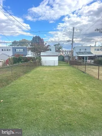 a view of a lake with a big yard