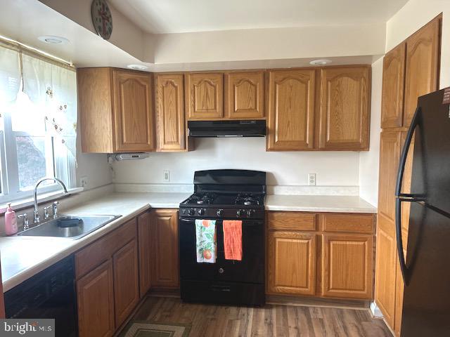 12159 Aster Road Philadelphia, PA 19154 - Photo 4 of 14 a kitchen with stainless steel appliances granite countertop a refrigerator stove and sink