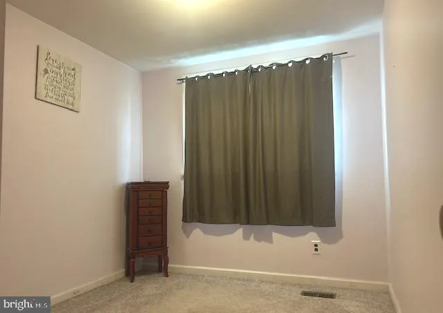 a bathroom with a shower and a tub