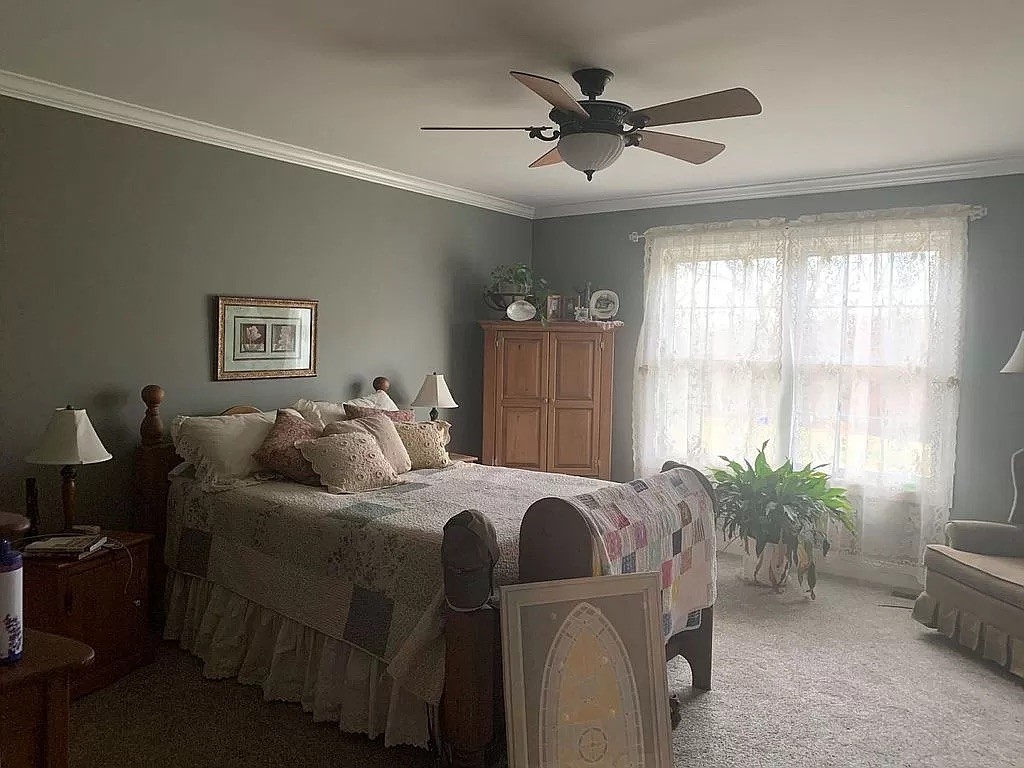 3685 South Hyde Road Springfield, TN 37172 - Photo 23 of 26 a bed room with a bed and a window